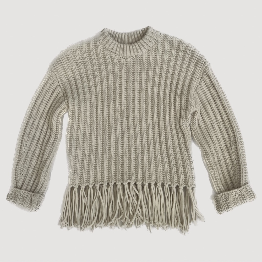 Thick ribbed knit sweater with fringe